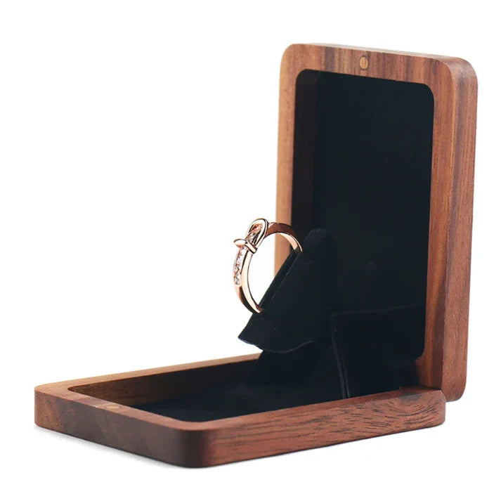 Lovely wooden rotating ring box at $11.97 from Truemartin