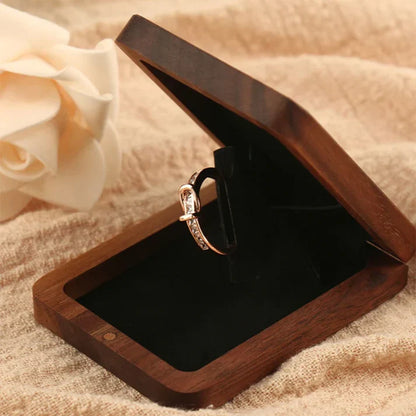 Lovely wooden rotating ring box at $11.97 from Truemartin